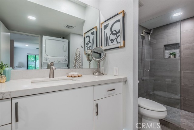 Fully Remodeled bathroom with custom vanity and quartz counter top.