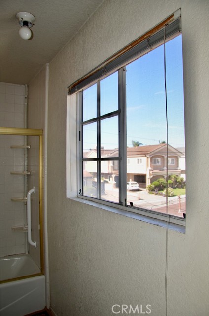 2nd Bathroom upstairs with shower/tub, and lots of natural light