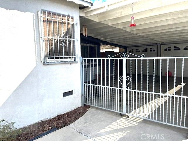 Two car garage beyond the carport.