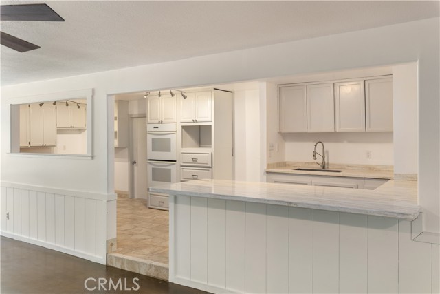 Kitchen area inside the one bedroom apartment.