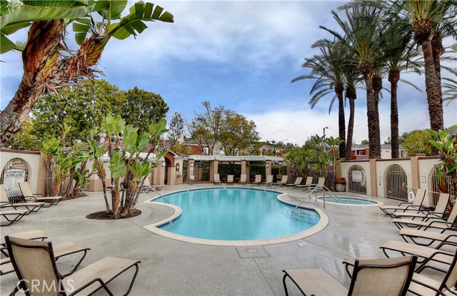 Beautiful Gated Association Pool with tropical landscaping - The Vineyards features walkways throughout the interior of the community