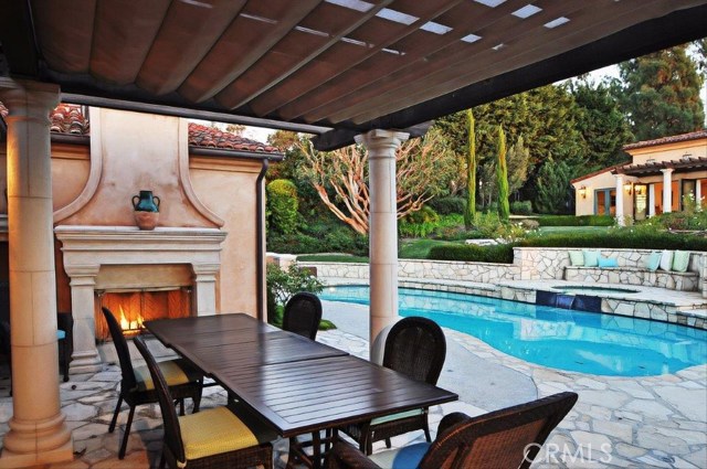 The main living space opens through french doors to this relaxing veranda