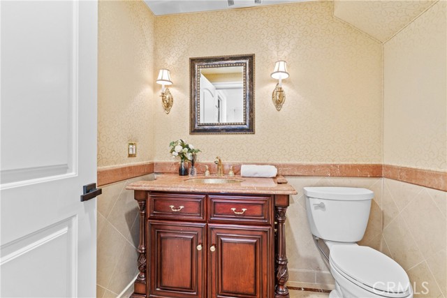 Powder room with charming details.