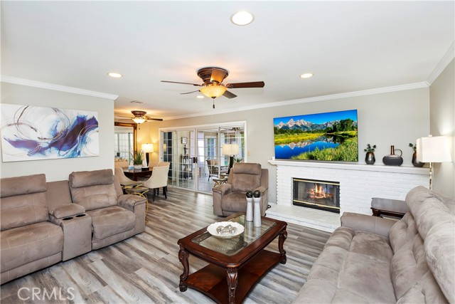 Family Room with Fireplace - Light the fire and curl up on the couch to watch a movie.