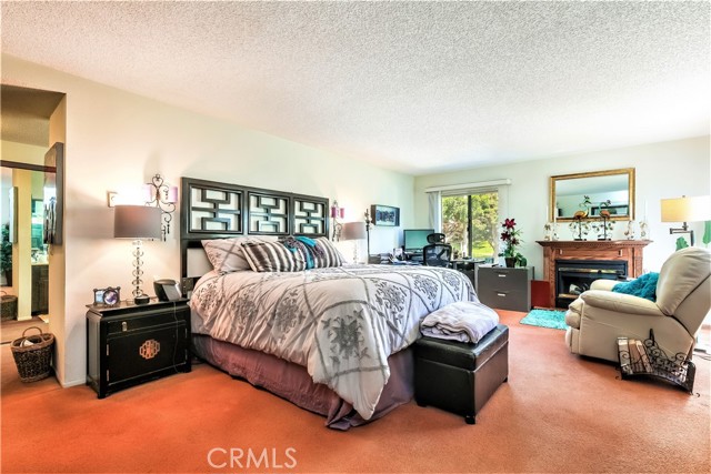 The Master Bedroom with it's Sunny Easter Exposure has a View out to The Green Belt and with all of it's Wall Space it can Comfortably Accommodate the Largest Bedroom Furniture