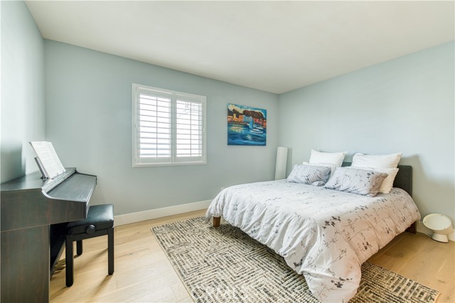 Primary bedroom with walk-in closet.