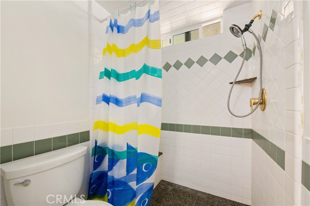 A master shower with a rest plat, senior friendly.