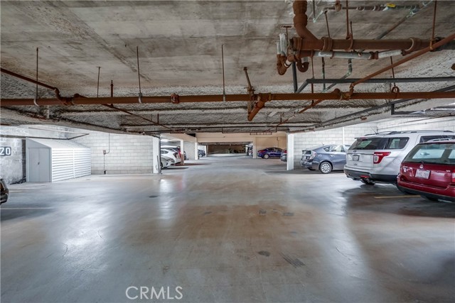 Gated parking structure with 2 parking spaces and elevator access. Gated parking structure with 2 parking spaces and elevator access.
