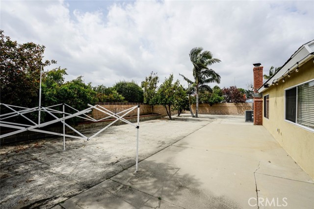 large back yard with cemeted slab