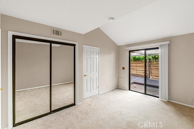 Bedroom 3 has slider access to deck and yard.