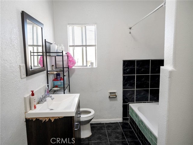 7714 S Broadway, Los Angeles CA: https://media.crmls.org/medias/49332353-f22c-424b-8cf4-f38ffff851e8.jpg
