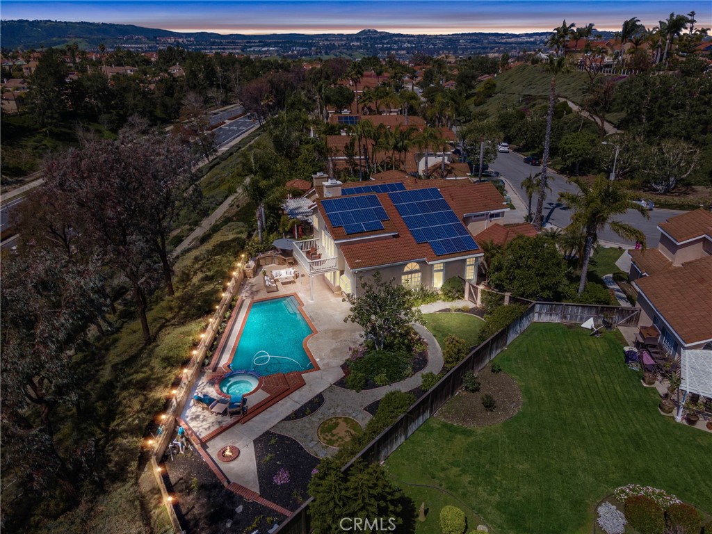Welcome to 25036 Rancho Clemente, a stunning estate located in the highly desirable community of Laguna Niguel, California. This magnificent 5 bedroom, 3 bathroom home sits on a sprawling 10,000 sqft lot, which is much larger than the average lot size in the area. The moment you step inside, you'll notice the abundance of natural light that fills the home, creating a warm and inviting atmosphere.
The updated kitchen is a chef's dream, featuring top-of-the-line appliances and ample space for meal prep and entertaining. The family/dining area adjacent to the kitchen is perfect for casual gatherings, while the formal living and dining areas are ideal for more intimate occasions.
Step outside into the backyard oasis, where you'll find an outdoor kitchen, large pool with spa, fire pit, and plenty of space to relax and play. The views from the backyard are simply breathtaking, offering the perfect location to enjoy stunning California sunsets and 4th of July fireworks. The backyard is also very private, making it the perfect retreat for both relaxation and entertaining.
As an added bonus, homeowners have access to The Club, which offers a plethora of amenities such as multiple pools, tennis courts, racquetball court, pickleball, exercise gym, playground, and barbeque. You'll also love the convenience of being just a short drive away from California's pristine beaches, luxury resorts and spas, designer shopping, top restaurants, and championship golf courses. Easy access to the I5 Freeway and the 73 toll road make commuting a breeze.
Don't miss this opportunity to own a luxurious estate in one of Southern California's most sought-after communities. Come see 25036 Rancho Clemente today and experience the best of coastal living! Welcome to 25036 Rancho Clemente, a stunning estate located in the highly desirable community of Laguna Niguel, California. This magnificent 5 bedroom, 3 bathroom home sits on a sprawling 10,000 sqft lot, which is much larger than the average lot size in the area. The moment you step inside, you'll notice the abundance of natural light that fills the home, creating a warm and inviting atmosphere.
The updated kitchen is a chef's dream, featuring top-of-the-line appliances and ample space for meal prep and entertaining. The family/dining area adjacent to the kitchen is perfect for casual gatherings, while the formal living and dining areas are ideal for more intimate occasions.
Step outside into the backyard oasis, where you'll find an outdoor kitchen, large pool with spa, fire pit, and plenty of space to relax and play. The views from the backyard are simply breathtaking, offering the perfect location to enjoy stunning California sunsets and 4th of July fireworks. The backyard is also very private, making it the perfect retreat for both relaxation and entertaining.
As an added bonus, homeowners have access to The Club, which offers a plethora of amenities such as multiple pools, tennis courts, racquetball court, pickleball, exercise gym, playground, and barbeque. You'll also love the convenience of being just a short drive away from California's pristine beaches, luxury resorts and spas, designer shopping, top restaurants, and championship golf courses. Easy access to the I5 Freeway and the 73 toll road make commuting a breeze.
Don't miss this opportunity to own a luxurious estate in one of Southern California's most sought-after communities. Come see 25036 Rancho Clemente today and experience the best of coastal living!