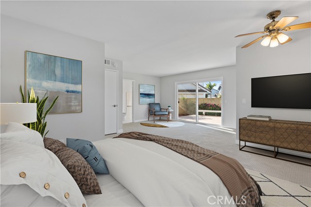 Downstairs primary suite virtually staged!