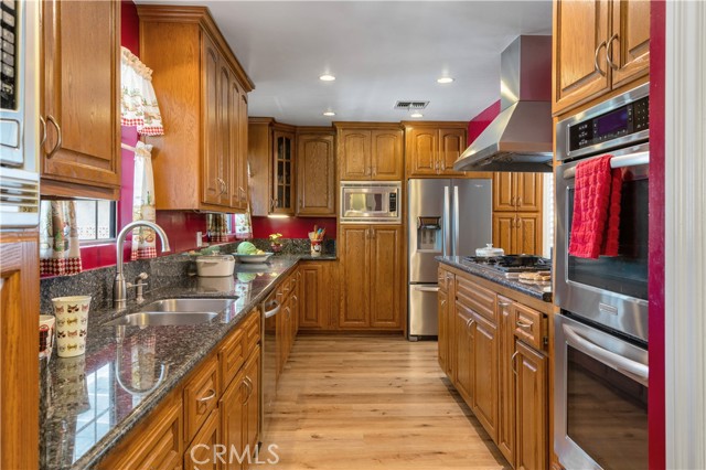 UPDATED KITCHEN WITH DOUBLE OVENS, 2 BUILT IN MICROWAVES