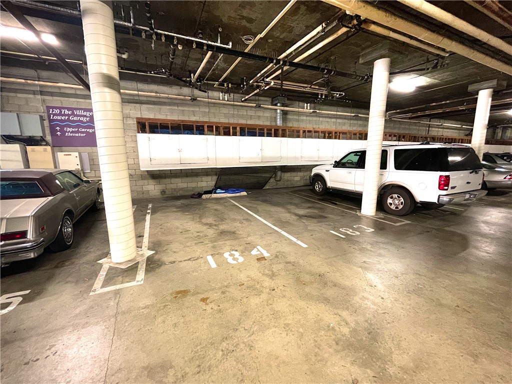 2 side by side parking spots with storage