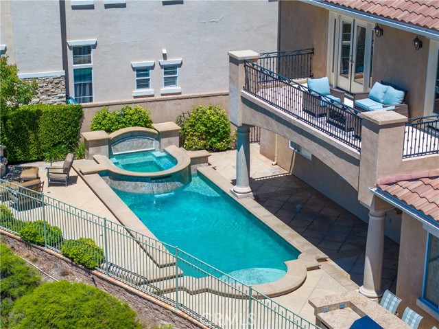 Aerial view of backyard and deck off loft and primary bedroom.