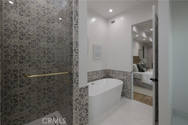 Decadent Walk-in Shower and Replenishing Soaking Tub