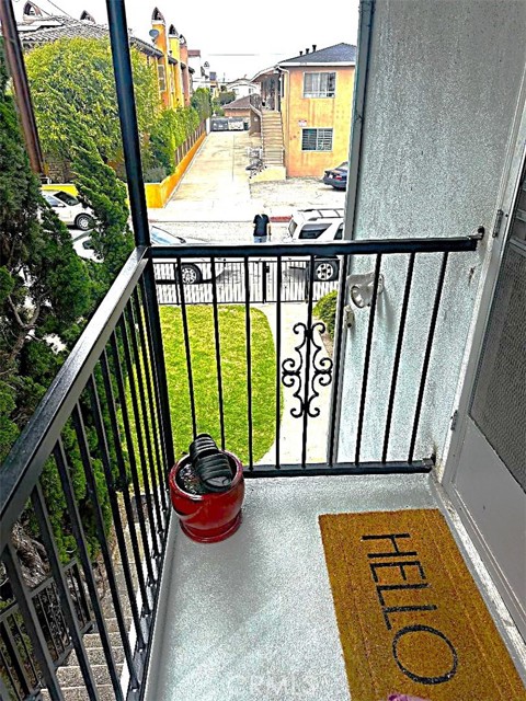 This is the View Looking Down to the Front Yard From the Front Upper Level Unit. This is the View Looking Down to the Front Yard From the Front Upper Level Unit.