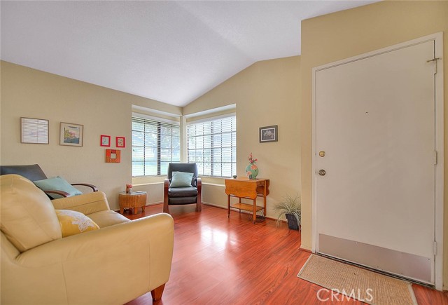 Front living room with large window that provide natural sunlight