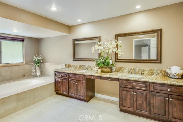 Tile floors, upgraded counter tops and a large bath are the perfect elements in a Master Bath
