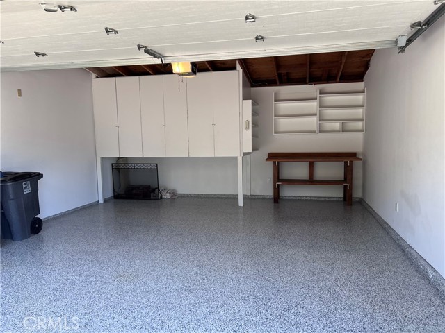 Epoxy floor garage with storage Epoxy floor garage with storage