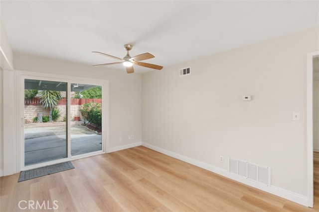 Dining area with slider that leads to back yard patio