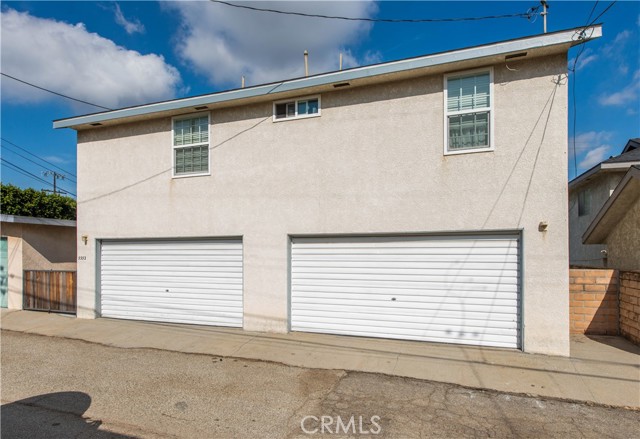 Two 2-Car Garages and Second Unit Above Garages