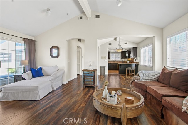 Living room open to Kitchen and upstairs patio