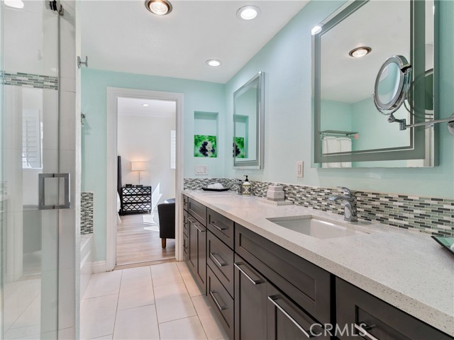 Master bathroom with modern fixtures.