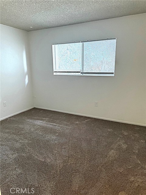 Bedroom one with new carpet and paint.