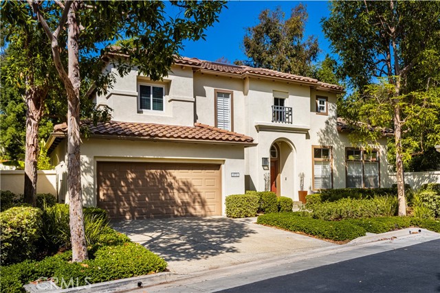 Introducing 10731 Taulbee Court, a stunning residence nestled in the highly desirable Presidio community of Tustin Ranch, California. This charming 3-bedroom, 2.5-bathroom home offers nearly 2,000 square feet of comfortable living space on an expansive corner lot, providing both privacy and abundant outdoor space perfect for entertaining or relaxing. Situated at the end of a serene cul-de-sac, this impressive home boasts one of the largest private yards in the area, complete with an interlocking paving stone patio, two tranquil fountains, and an expansive lawn. The property sits on a large corner lot that is nearly 10,000 square feet in size. Inside the home you will find an open and spacious floor plan enriched by high ceilings with beautiful stone flooring downstairs, and maple hardwood floors upstairs. The kitchen features white cabinetry, stainless steel appliances (including a new refrigerator and dishwasher), granite countertops, Viking cooktop, and functional space for family gatherings. Upstairs, the home offers a luxurious master suite with a coffered ceiling, walk-in closet with organizers, and a private ensuite bathroom with dual sinks, a skylight, large glass shower, and Roman tub. The two additional bedrooms upstairs share a full bath. The additional half bath is conveniently located downstairs, perfect for guests and entertaining. The patio can accommodate gatherings year-round, featuring two fountains and surrounded by eleven-foot walls covered in lush, green creeping fig, and an outdoor sound system. The backyard’s large green lawn is a true highlight, with plenty of room for kids to play and a dream garden. The home is equipped with modern comforts such as plantation shutters, surround sound speakers in the family room, recessed lighting, a Halo carbon-filter water system, and a Nest smart thermostat. Additionally, the property includes a new A/C unit, two-car garage, and a highly desirable full driveway. Residents of the Presidio community enjoy access to an association pool, spa, and BBQ area, as well as proximity to award-winning schools like Peters Canyon Elementary, Pioneer Middle School, and Beckman High School. The home is also just a half mile from Peters Canyon Regional Park, a 354-acre park for hiking, running, biking, and exploring. No Mello-Roos and low HOA fees allow this home to fit in any budget. Don't miss your chance to own a home that offers space, comfort, and a fantastic community.