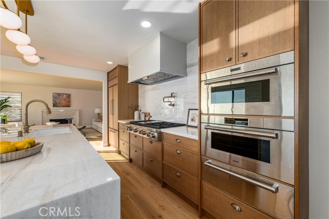 Center island, double sink, plenty of counter space.