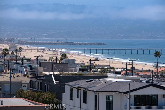 HB Pier, RB Break Wall & Marina plus queen's necklace white water views looking south