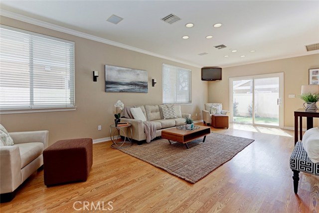 Living Room View 2-This is spacious enough to put dining table near sliding door and free up dining area for another cozy reading nook by the fireplace.