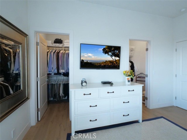 Showing the two walk-in closets in MBR #1 (upper)