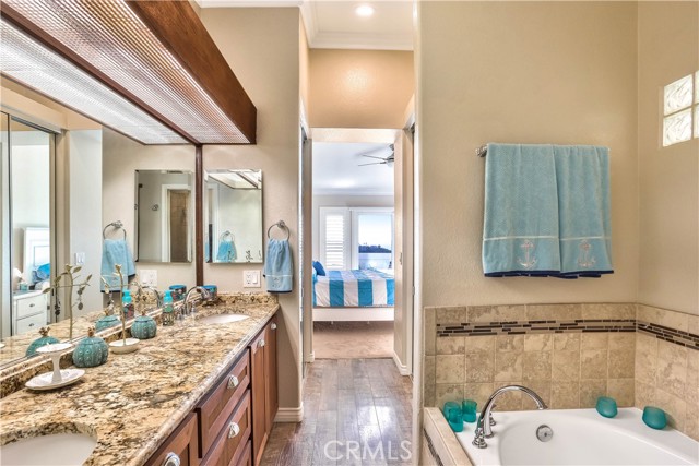 The ensuite master bathroom has a soaking tub as well as a walk in shower.