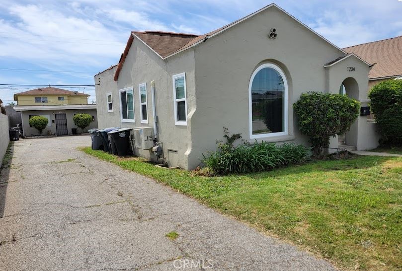 Triplex at 1234 W 163rd