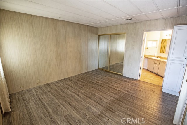 Spacious primary bedroom with private bathroom