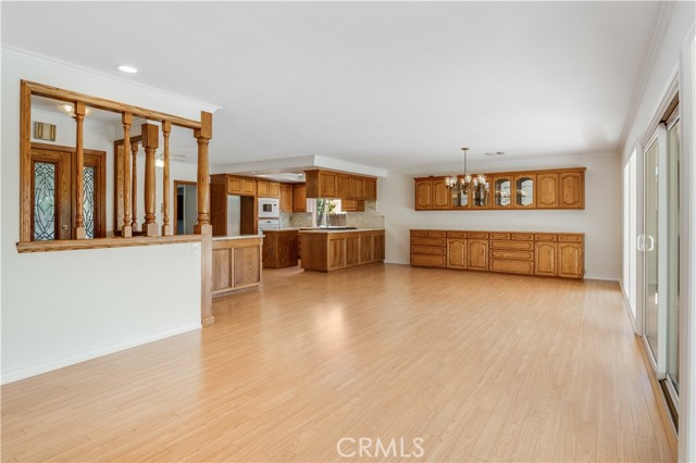 Open floor plan toward dining area.  Large enough for all the table leaves to be in place.