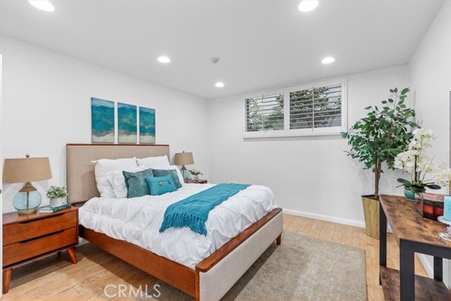 Spacious bedroom with view of courtyard greenery!