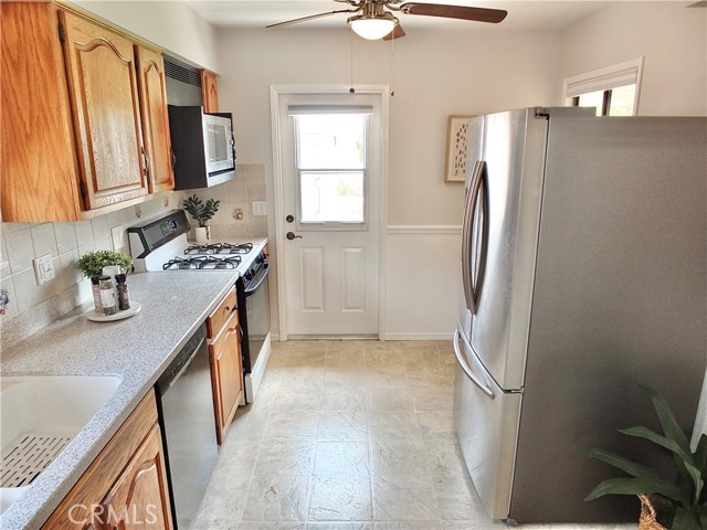 Door in kitchen leading to backyard