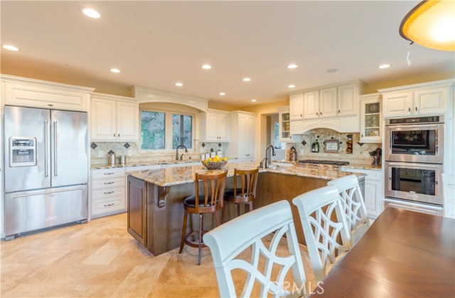 Kitchen is adjacent to dining room and family room.