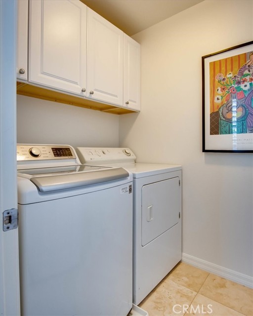 Centrally located laundry room.