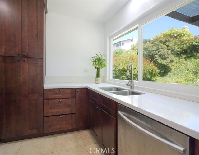 Kitchen Overlooking to Backyard Kitchen Overlooking to Backyard
