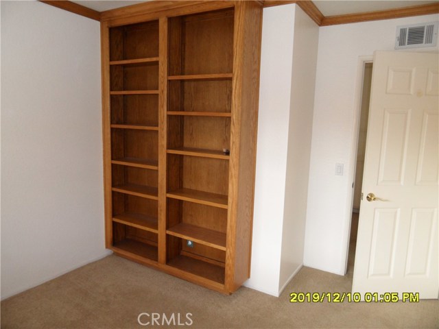 Second Bedroom Bookcase and Crown Molding