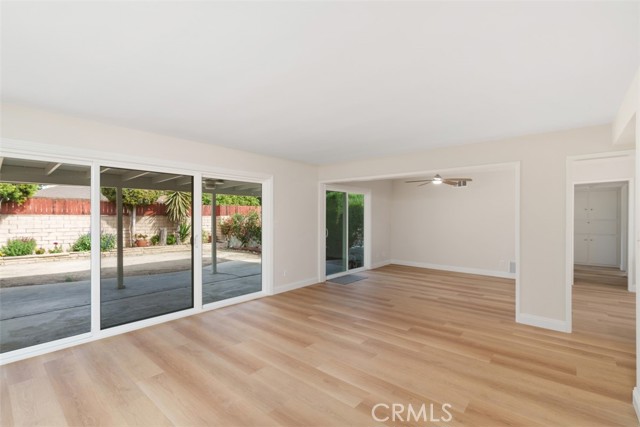 Spacious living room and dining area, featuring 12 foot and 6 foot new double-pane vinyl sliding doors