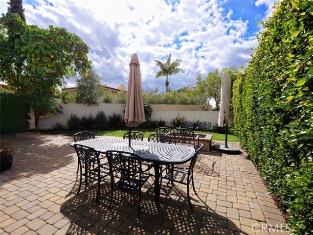 Dining and Sitting Area with Firepit in Patio