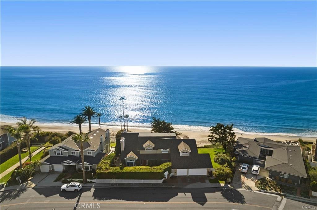 Here is your chance for a vacation stay at an Iconic bluff front property in Southwest San Clemente. Named the Beachcomber Bluff for its promontory point, sprawling lawns, quintessential California foliage, and ample privacy that sets a scene of peaceful rejuvenation. Embracing the beach life offering ocean views from every window, seamless indoor-outdoor spaces, and a seaside environment that will settle your soul. A coastal gem with over 4100 sq ft of sophisticated living space on a 15,000 sq ft lot with 140 ft of ocean frontage. With 5 bedrooms and 6 beds this home comfortably sleeps 10 guests. A freshly remodeled kitchen and brand new luxury furnishings with a contemporary coastal vibe. There are a wide variety of spaces from the master retreat with separate tub and shower, a spacious window lit office, covered decks for outdoor dining and lounging, a billiard room, an outdoor shower, a private hot tub, and a dedicated kids space in a large loft room with hidden Murphy bed, seating area, gaming system, game table and games.  Embrace the coastal life of San Clemente with beach access to Lost Winds just outside your door where you can enjoy a popular surf break, volleyball, or take a jog or bike ride on the 2.6 mile beach trail.  Some of the best surfing in the nation is in San Clemente with the famous breaks of Trestles, T Street and San Onofre minutes away.  You will have plenty of stocked goods to make the most of your beach adventures. (2 beach cruisers, yoga mats, surfboards, body boards, coolers, beach towels, beach chairs, and beach umbrellas) Enjoy Downtown Del Mar, a staple in Orange County, with its award winning restaurants, boutique shops, festivals and popular nightlife. The San Clemente Coastal life is magical and this amazing home embraces it. The Beachcomber Bluff, a bluff above and a world away.  This is a fully furnished monthly vacation rental.  Monthly rates vary depending on the month. With higher rates in the spring and summer seasons.
