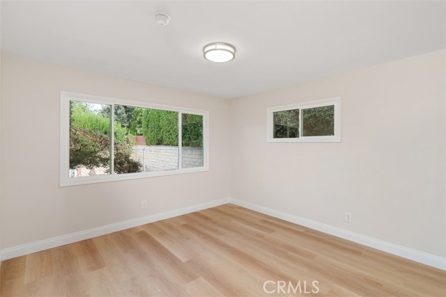 Large bedroom features two new double pane windows