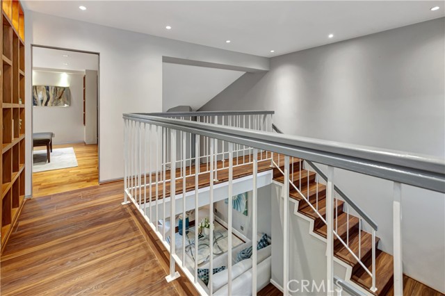 Upstairs' hallway partial view of master bedroom